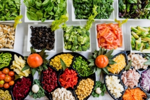 Different vegetables arranged on plates